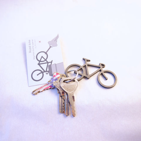 Road bike keychain bottle opener